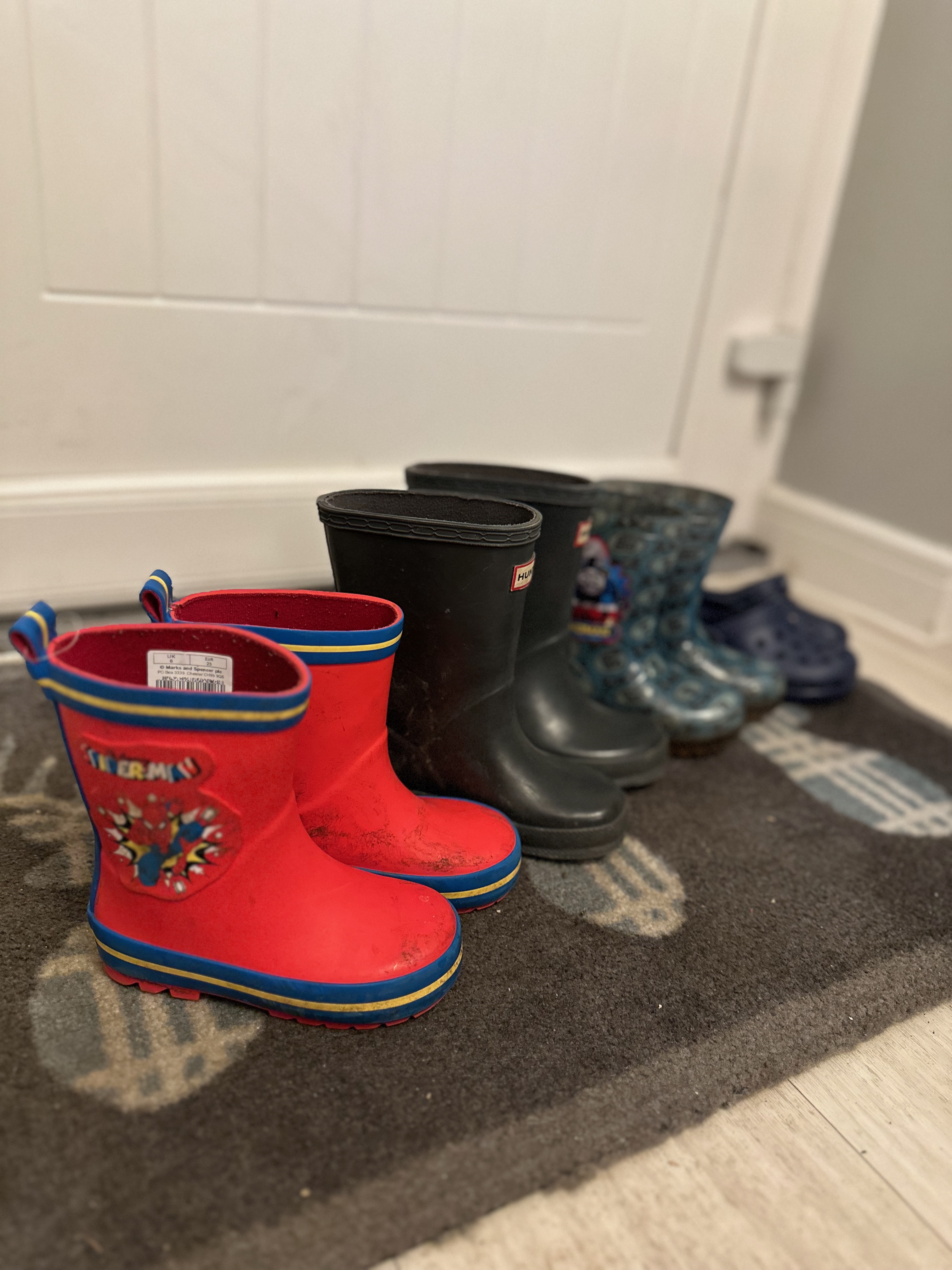 Arthur's array of wellies (and a stray pair of crocs)
